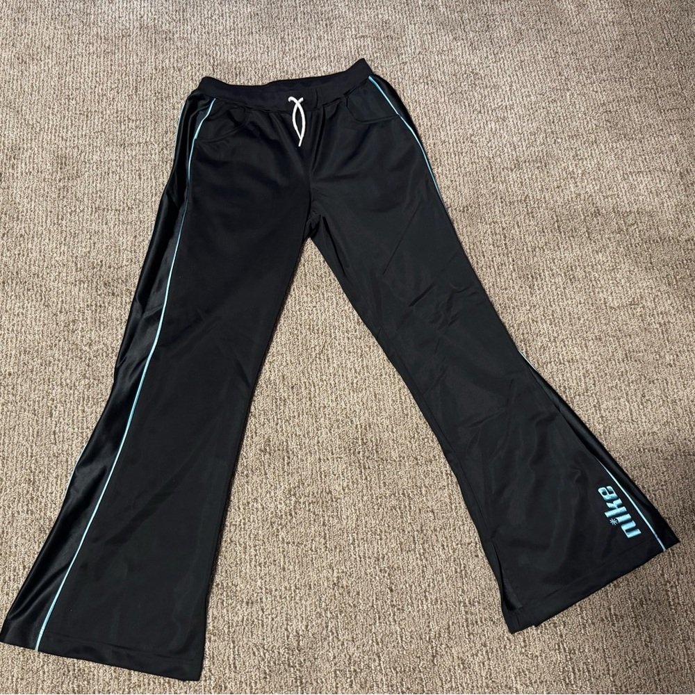 Nike Kids Black Joggers with Blue Trim